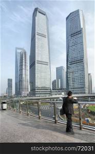 SHANGHAI, CHINA - APRIL 8, 2014: Shanghai Lujiazui flyover and buildings of Pudong New Area
