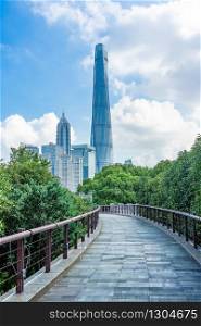 SHANGHAI, CHINA - OCTOBER 13, 2019: Gucheng Park (Northeast Gate) ? A popular public park with a backdrop of the famous Shanghai skyline