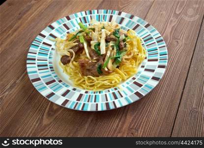Shanghai Noodles - style fried noodles with meats and mixed vegetables