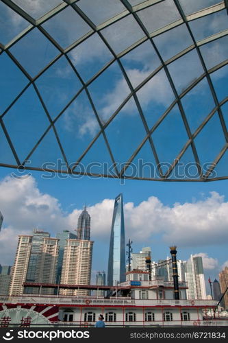 shanghai pudong view from puxi new bund on a sunny day with white clouds and blue sky