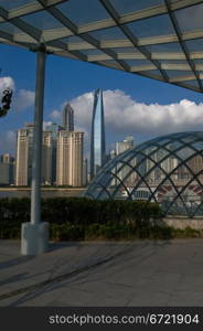 shanghai pudong view from puxi new bund on a sunny day with white clouds and blue sky