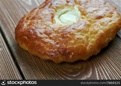 shangii- patties with cottage cheese Russian pastry.on a wood background