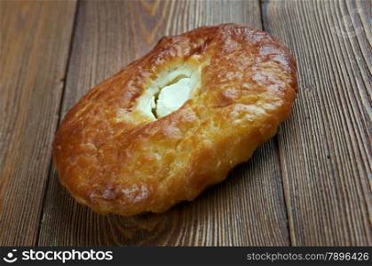 shangii- patties with cottage cheese Russian pastry.on a wood background