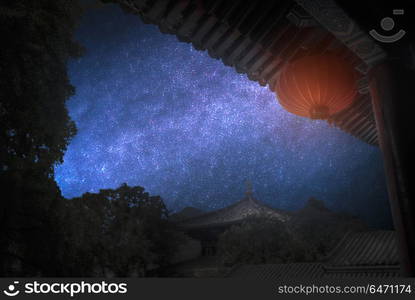 Shaolin is a Buddhist monastery in central China. Located on the mountain. Astrophotography, night starry sky. Shaolin is a Buddhist monastery