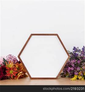shaped frame picture among flowers