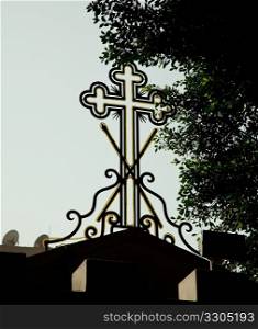 Shapely cross on Coptic Christian building in Cairo, Egypt