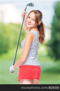 Shapely successful girl with a golf club on a background of golf courses