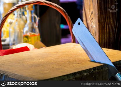 sharp knife jumper is placed in a wooden cutting board