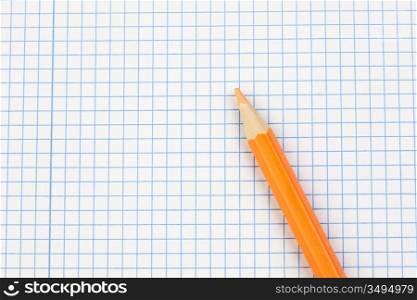 Sharp pencil on a notebook in blank