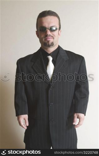 Sharply Dressed Man Wearing Sunglasses