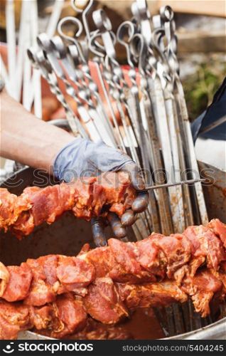 Shashlik on skewers closeup. Raw meat. Preparation for cooking