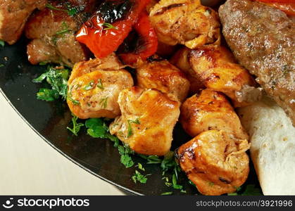 Shashlik , shish kebab .salmon making roasted with vegetable closeup