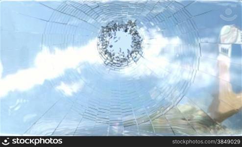 Shattered glass with slow motion and blue sky. Alpha is included