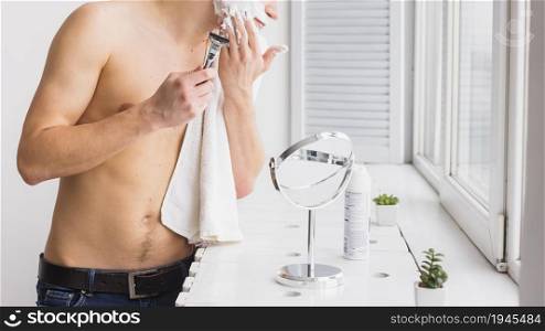 shaving concept with attractive young man. High resolution photo. shaving concept with attractive young man. High quality photo