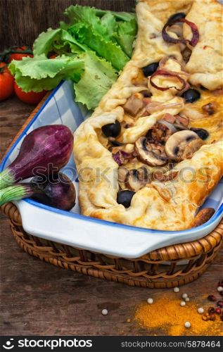 Shawarma. baked in the oven meat shawarma with vegetables in a rustic style.The image is tinted