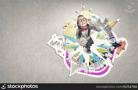 She explore this wold. Wideangle picture of funny schoolgirl with paper plane