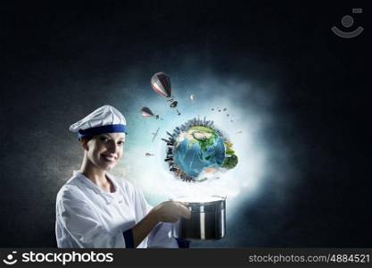 She is magician as cook. Pretty woman cook in hat and apron with pot in hands. Elements of this image are furnished by NASA