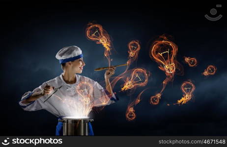 She is magician as cook. Pretty woman cook in hat and apron opening pot