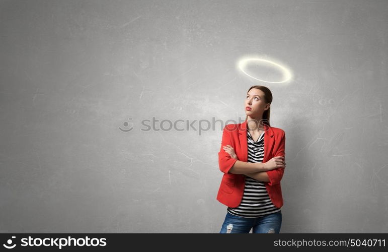 She is pure angel. Young saint woman with halo above head