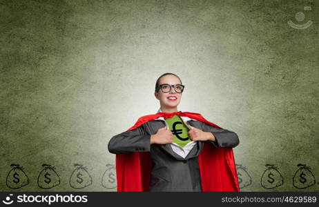 She is super financier. Young woman acting like super hero with euro sign on chest