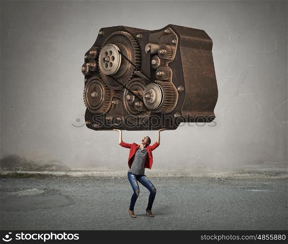 She possesses constructive thinking. Young woman in red jacket and gear mechanism