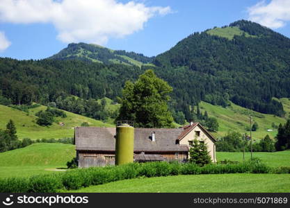 Shed on the farm field in Switzerland