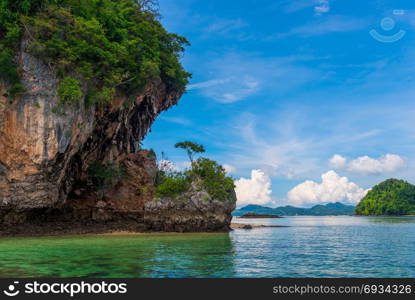 sheer high rock in the sea, beautiful seascape on a sunny day, Thailand province of Krabi
