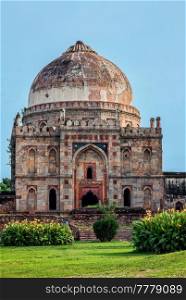 Sheesh Gumbad - islamic tomb from the last lineage of the Lodhi Dynasty. It is situated in Lodi Gardens city park in Delhi, India. Sheesh Gumbad tomb in Lodi Gardens city park in Delhi, India