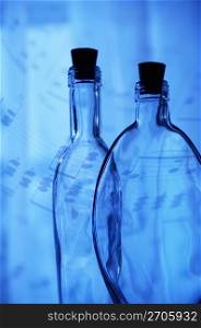 Sheet music and Bottle