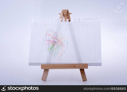 Sheet of white paper put on tripod for painting on white background