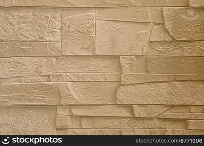 Sheet wallpaper with the model stone wall with irregular elements.It is a brick pattern Greek in colour grey.Horizontal view.