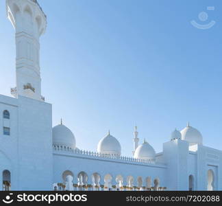 Sheikh Zayed Grand Mosque Center, Abu Dhabi. The largest mosque in United Arab Emirates or UAE. Muslim or Islamic white architecture building. Landmark tourist attraction.