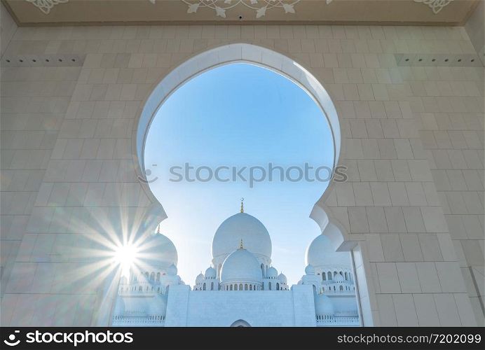Sheikh Zayed Grand Mosque Center, Abu Dhabi. The largest mosque in United Arab Emirates or UAE. Muslim or Islamic white architecture building. Landmark tourist attraction.