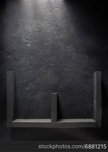 shelf and black wall on wooden background