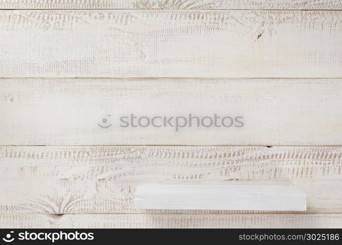 shelf at white plank wooden background texture