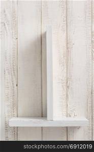 shelf at wooden background texture