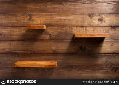shelf on wooden wall background texture