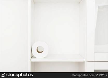 shelf with toilet paper roll