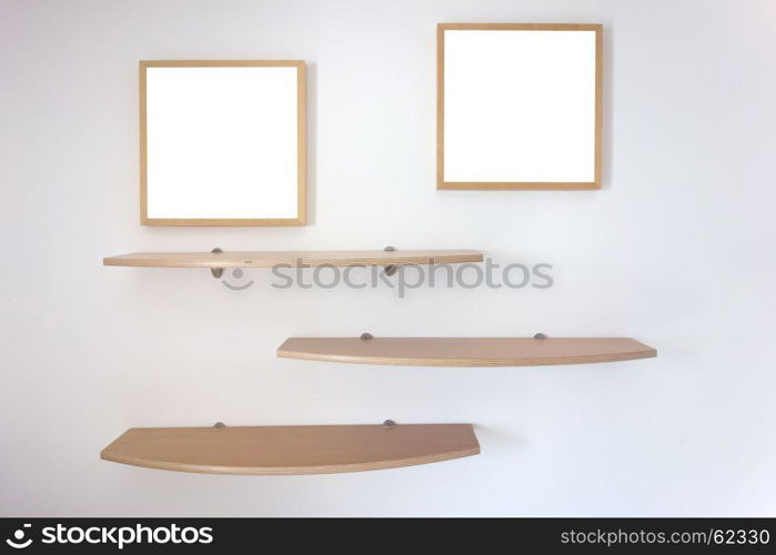 shelves and photo frames on a wall