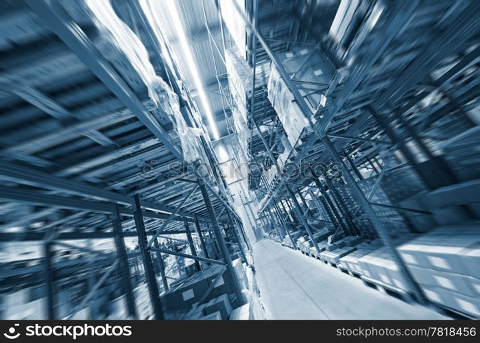 Shelves, full of boxes in a huge warehouse, ready for transport to the customer