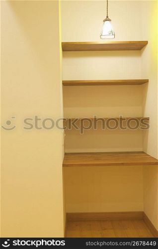 shelves next to a door