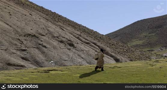 Shepherd in a valley, Atlas Mountains, Morocco