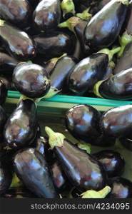Shiiny purple eggplants or aubergine at a French market