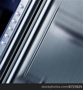 shining metal texture in perspective for background with rivets