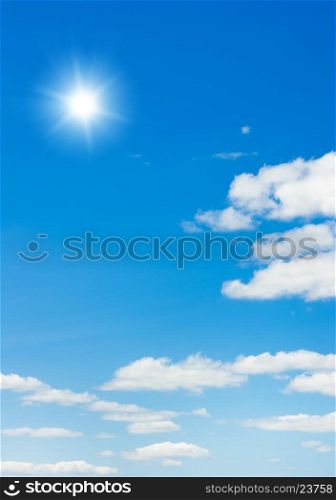 Shining sun at clear blue sky with copy space