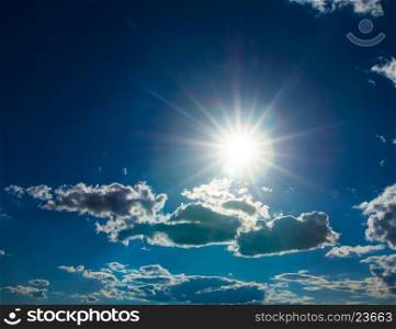 Shining sun at clear blue sky with copy space&#xA;&#xA;