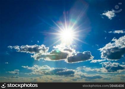 Shining sun at clear blue sky with copy space&#xA;&#xA;