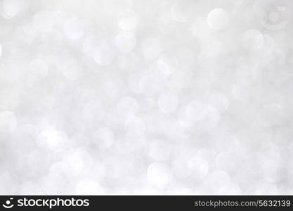 Shiny abstract silver defocused glitter background