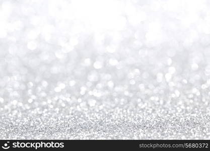 Shiny abstract silver defocused glitter background