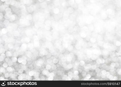 Shiny abstract silver defocused glitter background